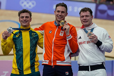 Paris Olympics Track Cycling men's sprint: Matthew Richardson of Australia (silver), Harrie Lavreysen of Netherlands (gold) centre, and Jack Carlin of Britain (bronze)